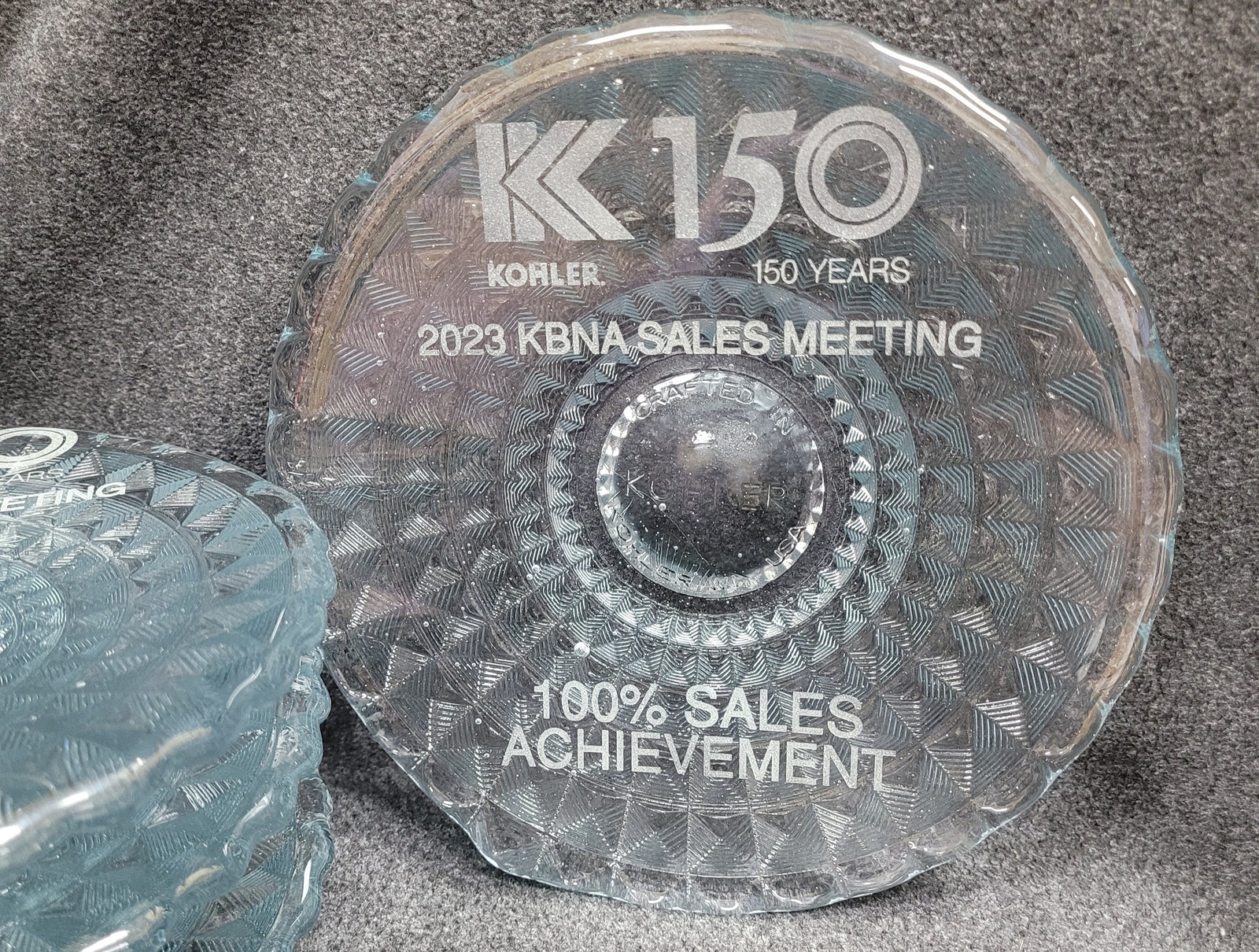 Sand carving completed on a hand crafted glass award